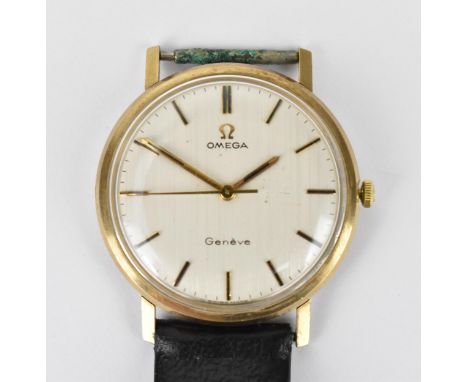 An Omega manual wind, gents, 9ct gold wristwatch, circa 1970 having a white dial with centre seconds and baton hour markers, 