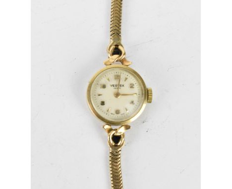 A Vertex manual wind, ladies 9ct gold wristwatch having a white dial with Arabic numerals, 9ct gold bracelet and clasp, the 1