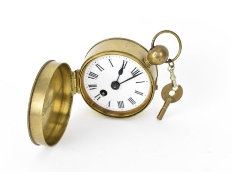 An early/mid 20th century converted watchmans brass cased clock, the white enamel dial having Roman numerals and fitted with 