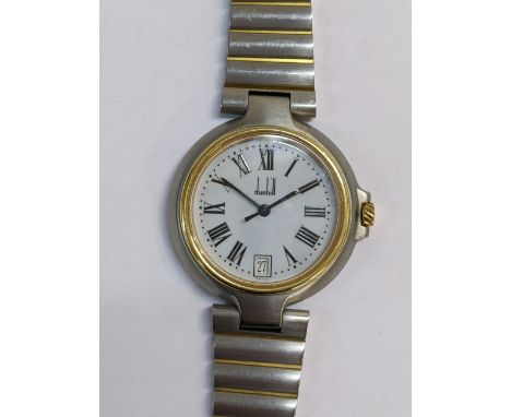 A Dunhill quartz bi-coloured metal wristwatch having a white enamel dial with Roman numerals and date aperture at 6, the case