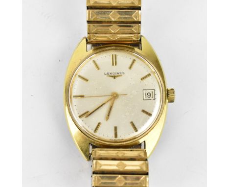 A Longines manual wind, gents, gold plated wristwatch, having a silvered dial with centre seconds, baton markers and date ape