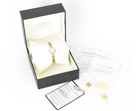 A Rotary Elite quartz, ladies 9ct gold wristwatch having a white dial with baton markers, 9ct gold bracelet and clasp, with b
