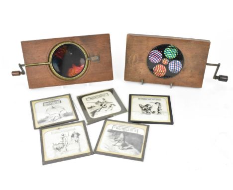 Two Victorian mahogany-mounted hand painted rack and pinion magic lantern slides, one impressed 'Newton &amp; Co Opticians', 