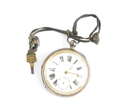 A late 19th century Waltham silver cased open faced pocket watch having a white enamel dial, with gilt hands, Roman numerals 