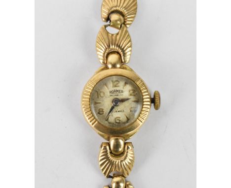 A mid 20th century Roamer manual wind, ladies 9ct gold wristwatch having a silvered dial with Arabic numerals and baton marke
