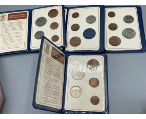 5x Britain’s first decimal coin folders all containing coins (one 10p coin missing)