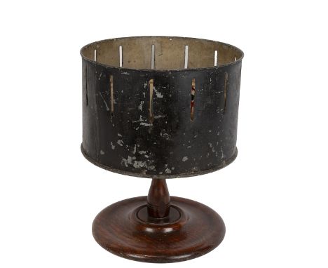 Late 19th Century Zoetrope probably made in France circa 1880. The drum constructed of painted tinplate and sitting on a turn