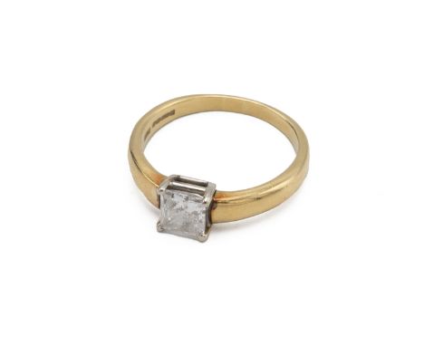 18ct gold and diamond ring, the princess cut diamond estimated as 0.75 carats, in a four-claw setting, finger size R 1/2, 5.3