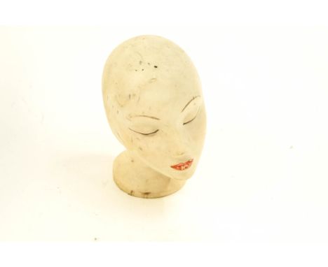 A mid 20th Century rubber female mannequin head
