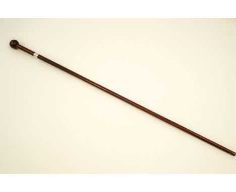 A South African hardwood stick with silver presentation collar