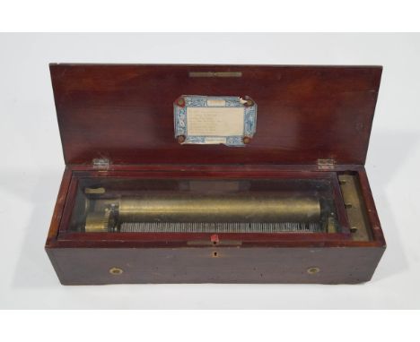 A 19th century mahogany cased Swiss musical box,playing eight airs, on a 33.5cm barrel case, 52cm wide 