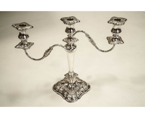 A silver plated three light candelabrum, square shaped base, reeded branches, 35.5 cm high