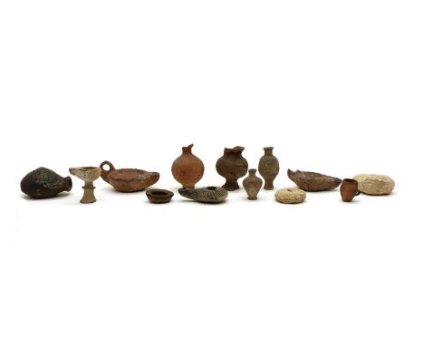 Archaeological items, comprising: three Roman lamps, a flask with suspension holes, five vases, pesestal lamp and a tiny bowl