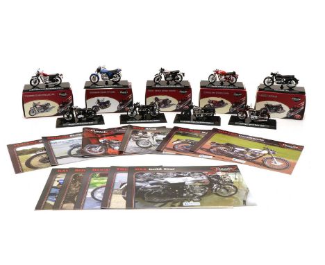 A collection of nine Edition's Atlas Classic Motorcycles,circa 2011, 1:24 scale, all in original boxes, together with a folde