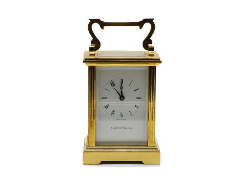 A Mappin &amp; Webb brass cased carriage timepiece,the white dial with Roman numeral hour markers in black, complete with key