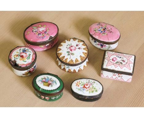 A group of seven George III enamel patch and other boxes,late 18th to 19th century, variously modelled and decorated with flo