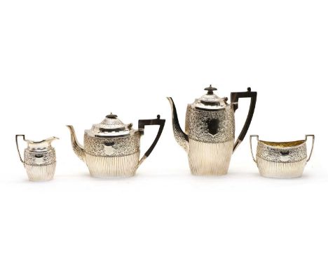 A Victorian four-piece silver tea service, by James Dixon &amp; Sons Ltd, Sheffield 1896, consisting of: a coffee pot, 23cm h