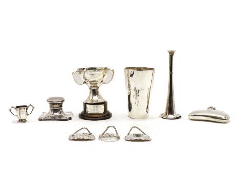 A collection of silver items, to include a spirit lighter, London 1890, engraved later, 18.5cm high, a spirit flask, two trop