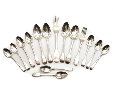 A collection of Georgian silver flatware,comprising three Old English pattern reeded dessert spoons marked W E, London 1802, 