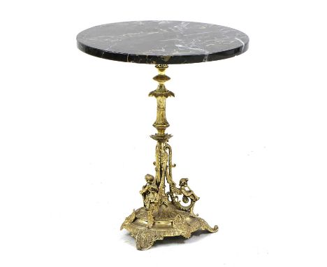 An early 20th century French design lamp table, the circular veined black marble top, raised on gilt mental pedestal base emb