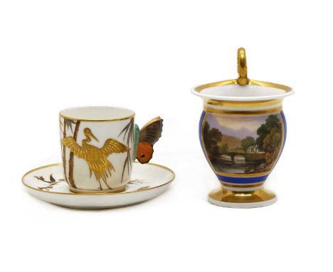 A Royal Worcester Aesthetic porcelain coffee can and saucer,c.1880, with a butterfly handle and relief gilding depicting a bu