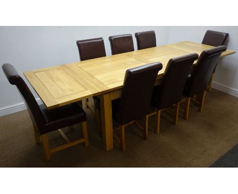 Light oak extending dining table, square supports (W280cm, H79cm, D90cm) and eight high back chairs, upholstered in a leather