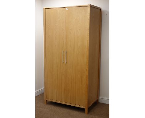 Modern light oak double wardrobe, two doors enclosing hanging rail and single shelf, stile supports, W93cm, H189cm, D59cm