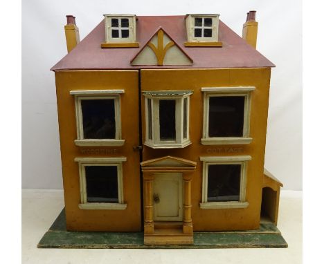 Early 20th century painted wooden dolls house Woodbine Cottage, two storey with a collection of vintage wooden and plastic fu