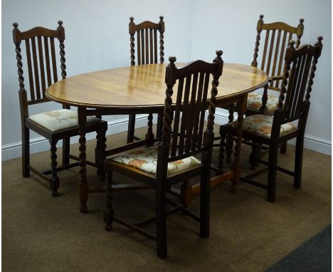 Early 20th century oval oak drop leaf table, gate leg barley twist supports (W107cm, H76cm, D179cm) and five (4+1) oak chairs