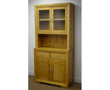 Light oak dresser, two glazed doors enclosing single shelf above two drawers and two cupboard doors, W90cm, H193cm Condition 
