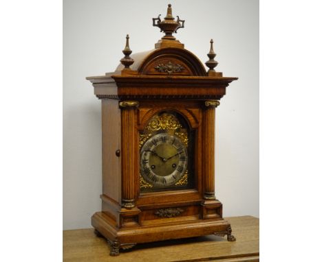 Edwardian oak architectural mantle clock circa 1908, arched top with urn and spire finials, square brass dial with silvered R