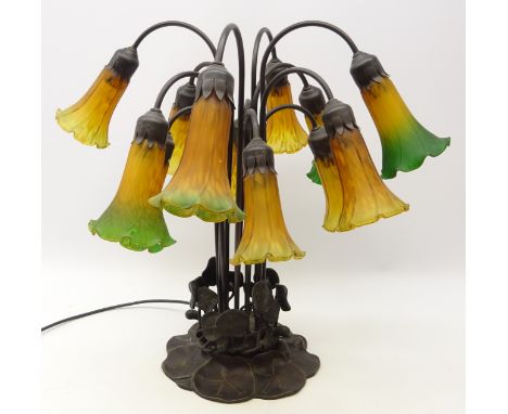 Art Nouveau style multi light table lamp, leaf cast metal moulded base with twelve mottled glass flower shaped shades, H54cm 