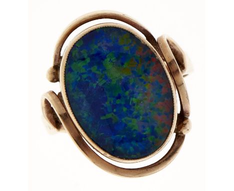 A synthetic opal doublet ring, in gold, marked 9ct, 5.3g, size N  Good condition