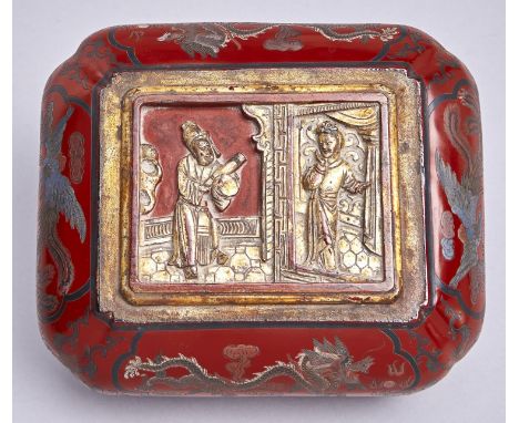 A Chinese carved, decorated and gilt export lacquer box and cover, early 20th c, 28cm l  Some natural accretion of dust and g