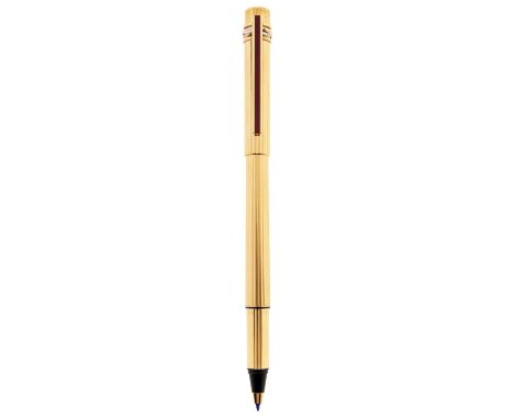A Le Must de Cartier gold plated Fineliner roller ball pen, Ref ST057321, No 140812, maker's box and booklets dated 1986  