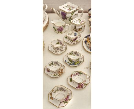 An unusual Powell &amp; Bishop bone china octagonal tea service, 1876-1878, printed and painted with flowering plants, the ri