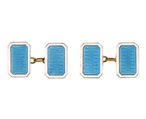 A pair of gold and turquoise guilloche enamel cufflinks, c1930, with white enamel border, 10 x 15mm, marked 9ct, 7.5g  Light 
