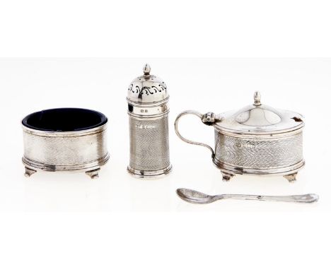 A George V three-piece silver condiment set, engine turned, blue glass liners, peperette 65mm h, by William Suckling Limited,