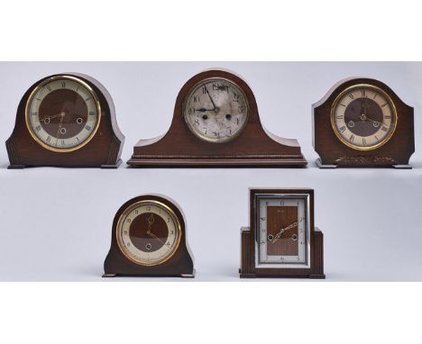 A walnut mantel clock, 1930's, 24cm h and four various contemporary oak and walnut mantel clocks (5)  
