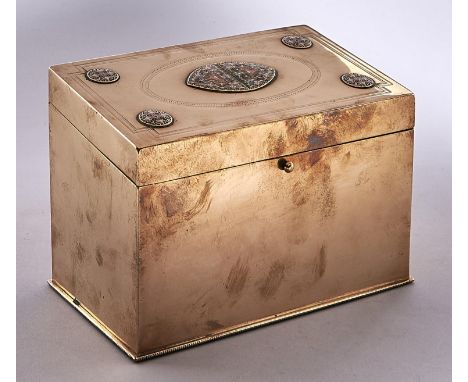 A Victorian brass and enamel stationery box, c1870,&nbsp;the sloping lid mounted with four geometric champleve enamel roundel