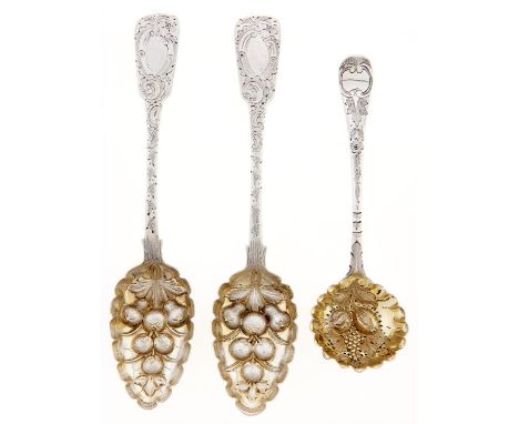A pair of Irish William IV silver tablespoons, Fiddle pattern, later chased and gilt as berry spoons, by James Le Bas, Dublin
