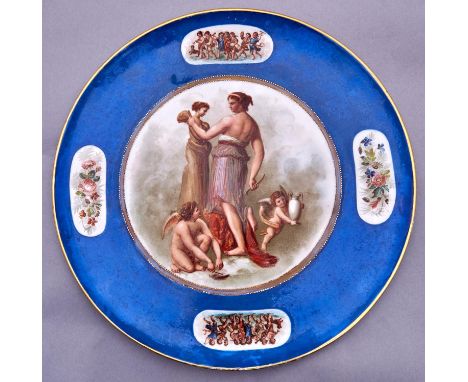 A Continental porcelain blue ground dish, c1900, painted with mythological figures and border sprays alternating with printed