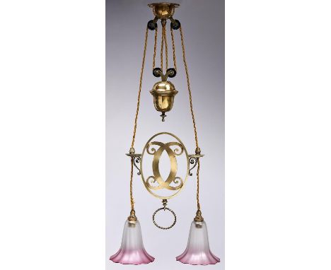 An early electric rise-and-fall electrolier, early 20th c, the rose and acorn shaped brass cased weight each with pair of bla