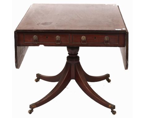 A Regency mahogany sofa table, c1820, the rectangular top with pair of rounded rectangular leaves, the frieze fitted pair of 