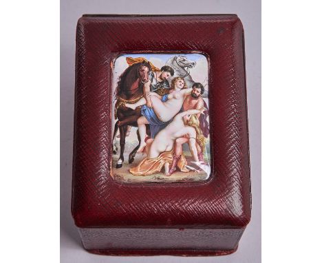 A maroon leather box, c1900, the sloping lid inset with an enamel plaque of the Rape of the Daughters of Leucippus after Sir 