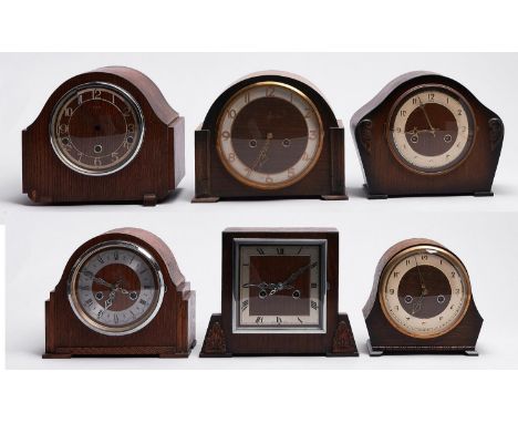 Six oak mantel clocks, 1930's-50's, various sizes  Evident from illustration
