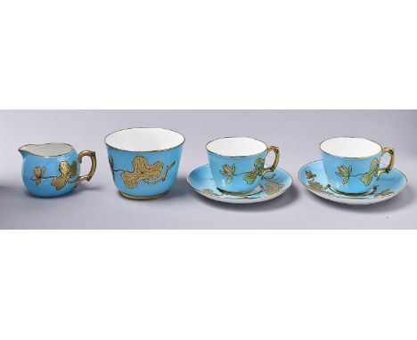 An aesthetic Minton tea set for two, 1875, moulded in shallow relief with waterlilies and bamboo on a turquoise ground, sugar