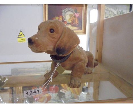 A vintage nodding dog.