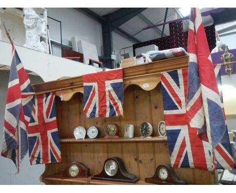 A quantity of vintage flags on poles etc.,