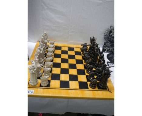 A chess set with board,